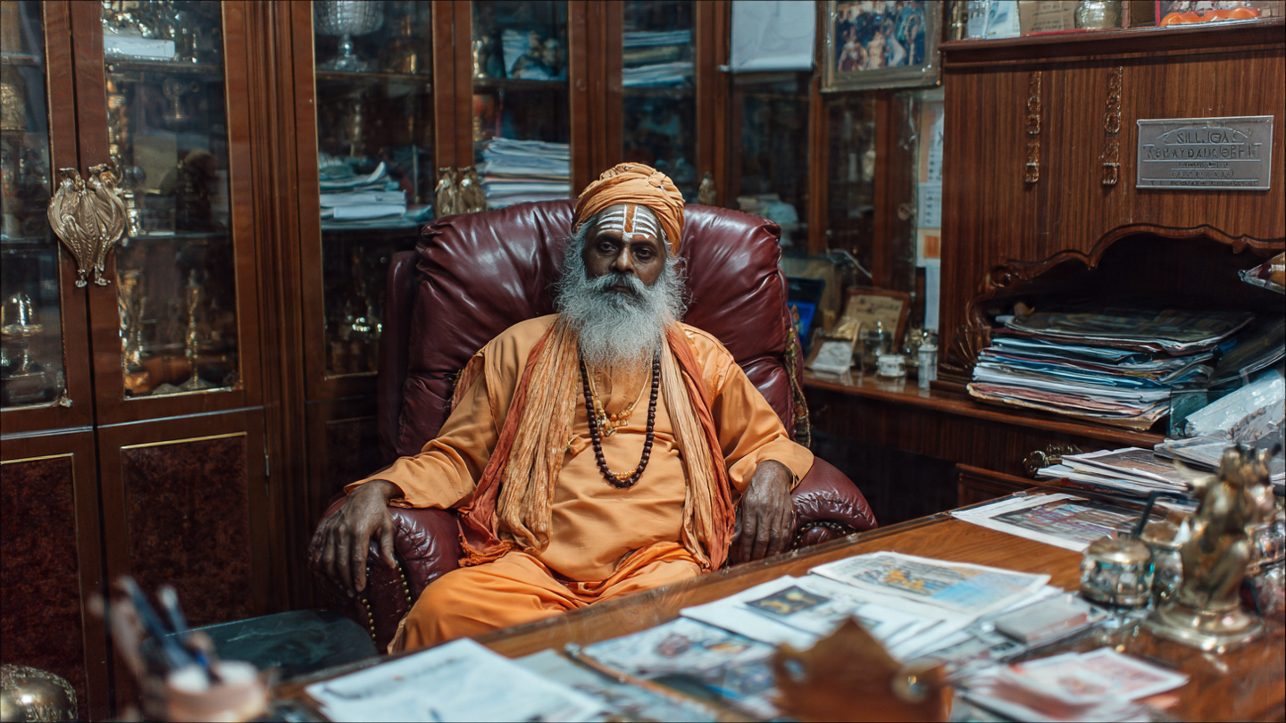 indian_guruji_seating_in_office (1)